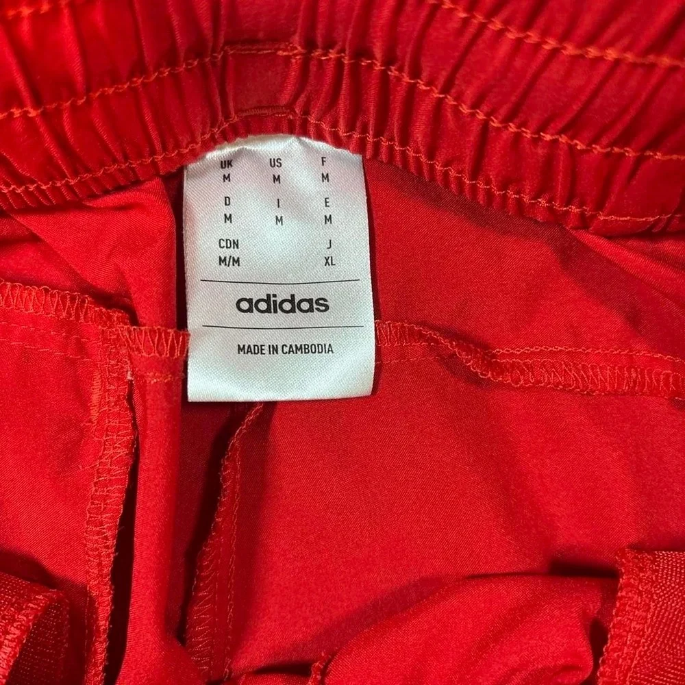 Red Adidas shorts size M